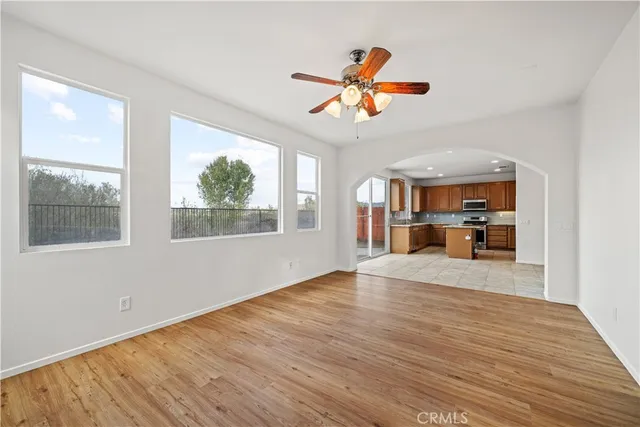 a view of house with yard outdoor seating area and barbeque oven