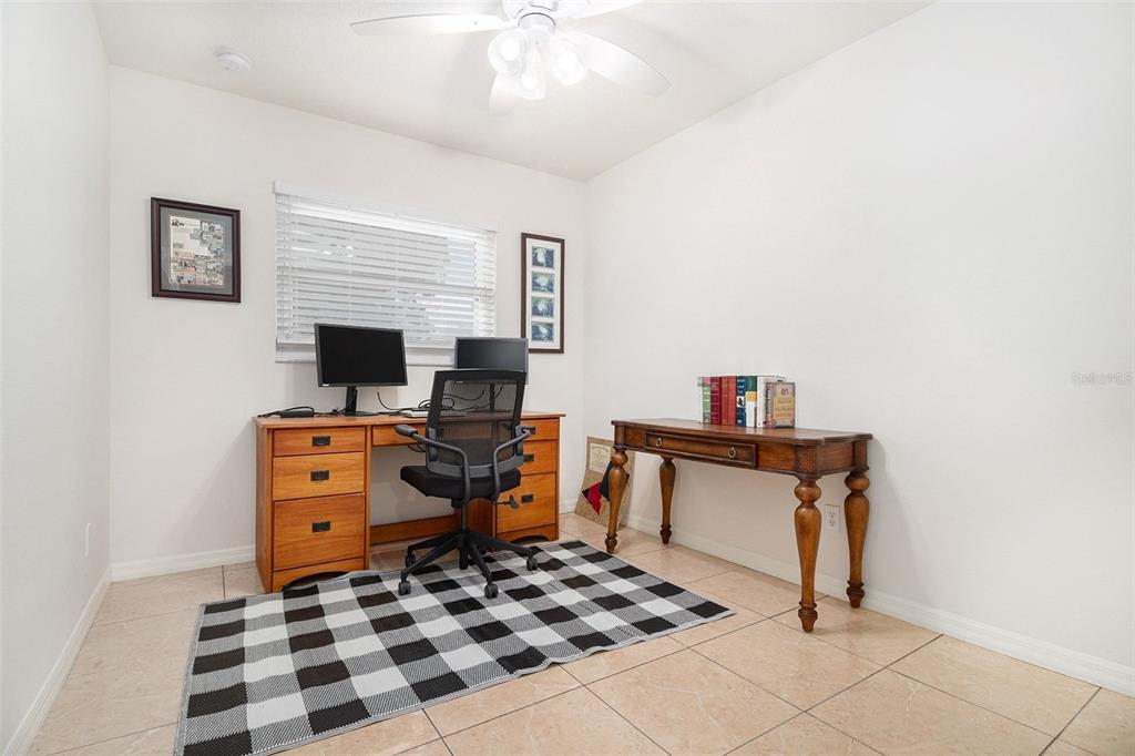 237 California Avenue St. Cloud, FL 34769 - Photo 15 of 26 a view of a workspace with furniture