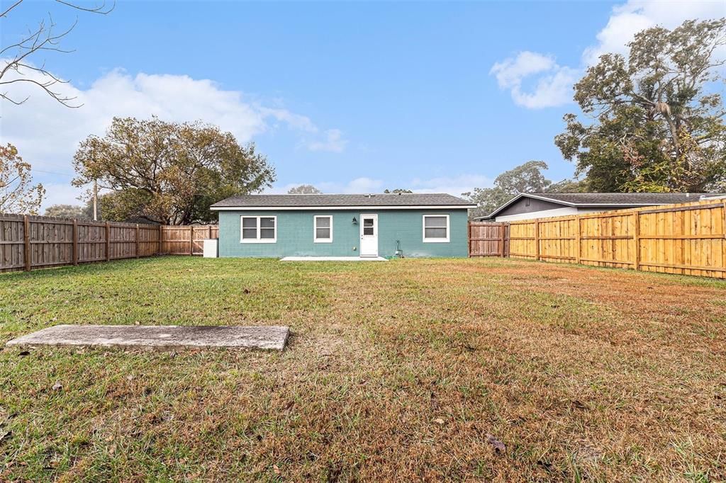 237 California Avenue St. Cloud, FL 34769 - Photo 21 of 26 front view of a house with a yard
