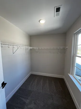 a view of a room with racks on the wall