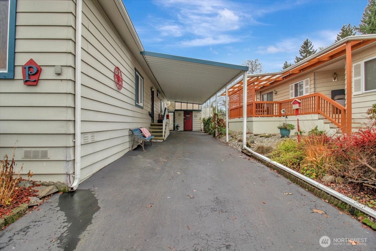 815 124th Street Southwest, Unit 52 Everett, WA 98204 - Photo 32 of 40 a view of a house with a garage