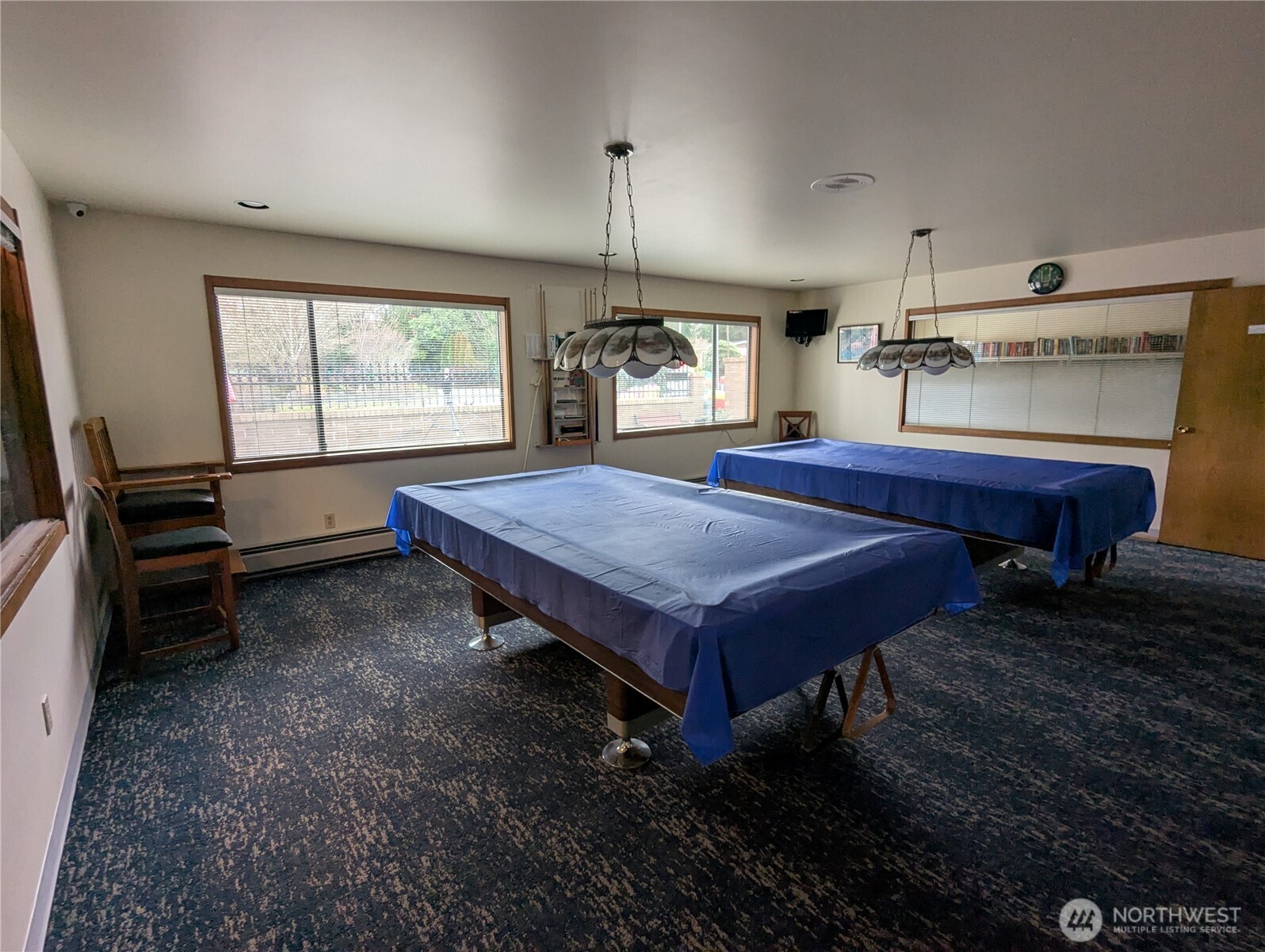 815 124th Street Southwest, Unit 52 Everett, WA 98204 - Photo 40 of 40 a room with wooden table and bed