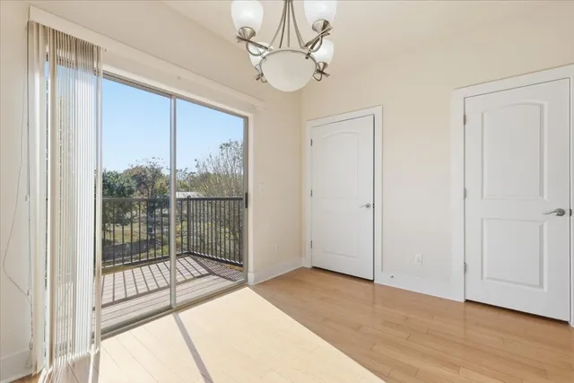 a view of a room with a large window