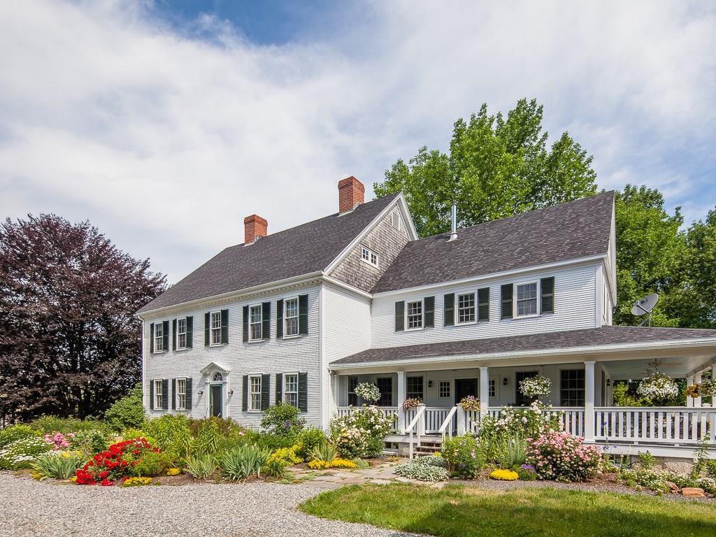 630 South Union Road Union, ME 04862 - Photo 2 of 26 Perennial beds grace the home and...