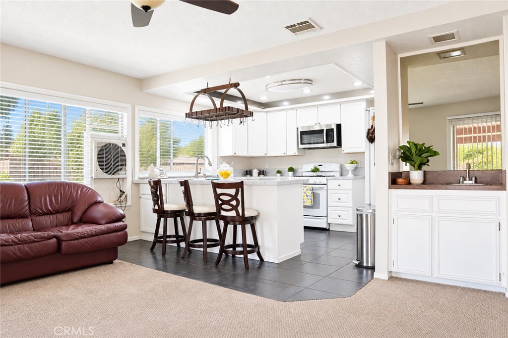 2164 North Date Avenue Rialto, CA 92377 - Photo 4 of 20 Kitchen opens to the family room for comfortable every day living and breakfast bar.