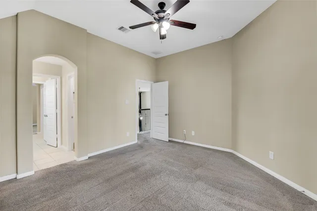 a view of a room with a large windows