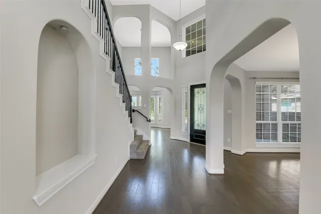 a view of entryway with wooden floor