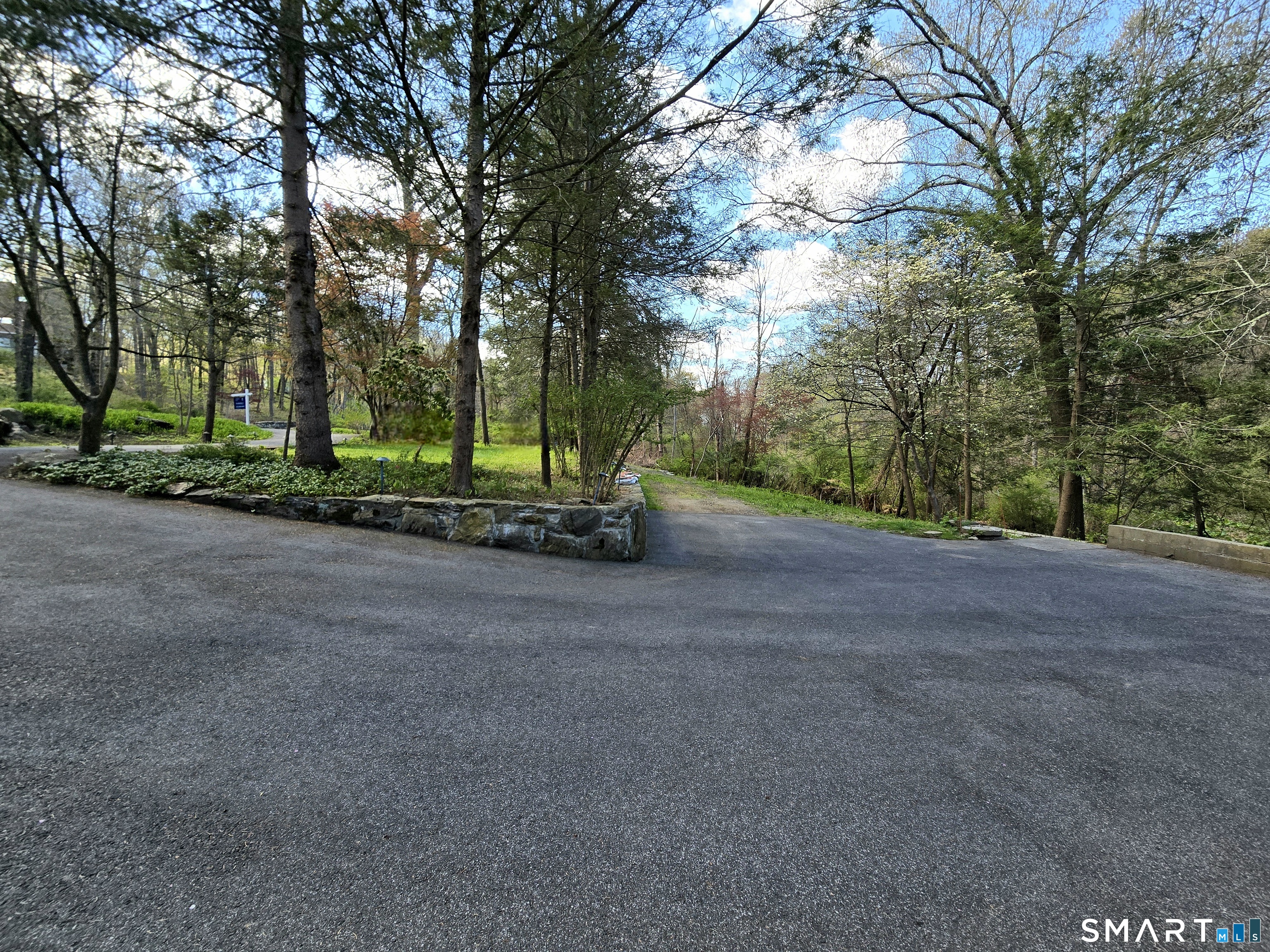 299 Redding Road Redding, CT 06896 - Photo 34 of 38 a view of a park with large trees