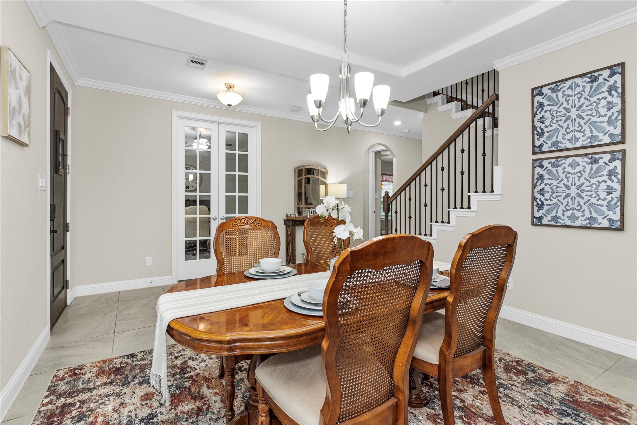 3622 Lister Drive Rosharon, TX 77583 - Photo 8 of 44 a dining room with furniture a rug and wooden floor