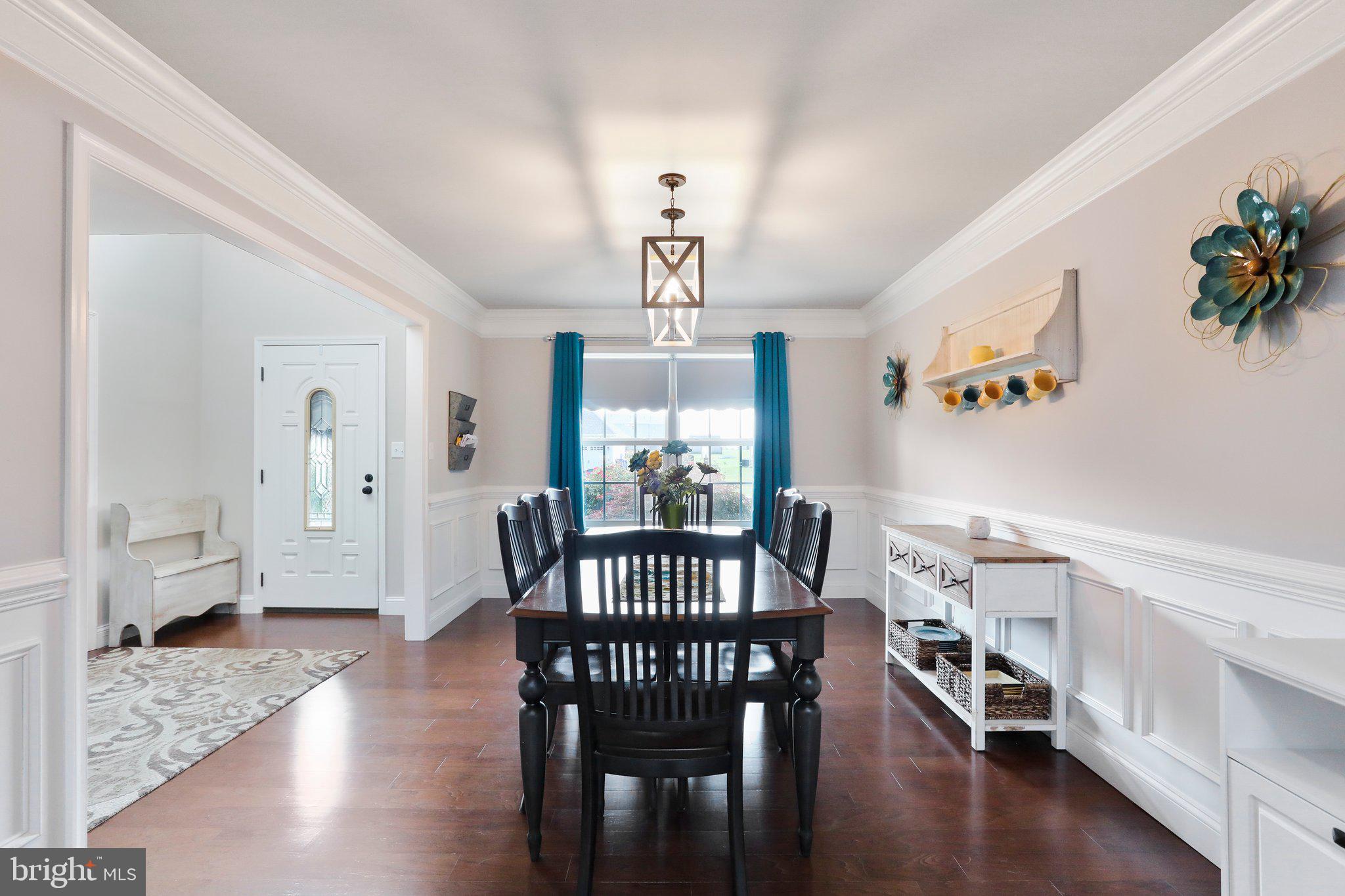 Formal dining room has hardwood floors!