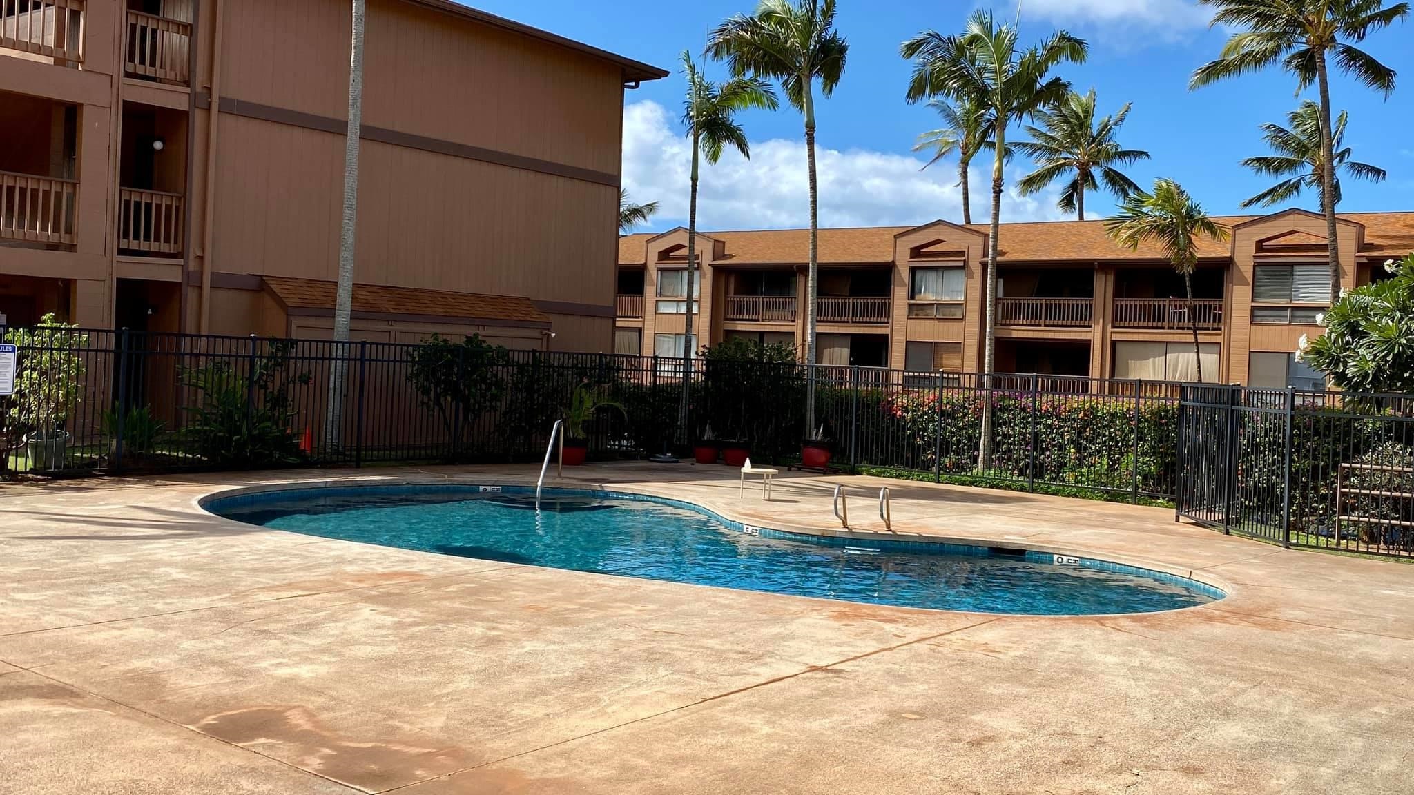 3740 Lower Honoapiilani Road, Unit G309 Lahaina, HI 96761 - Photo 11 of 17 a view of a house with a backyard
