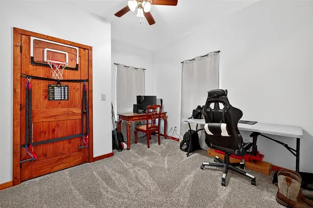 a view of a workspace with furniture