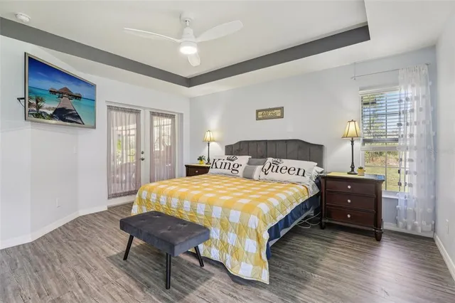 a bedroom with a bed and a table