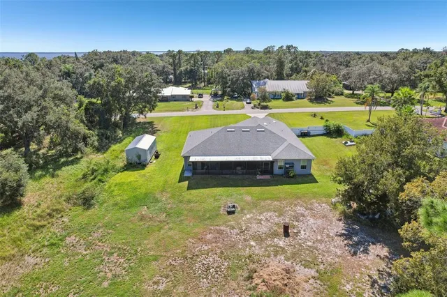 a view of a swimming pool with lounge chair