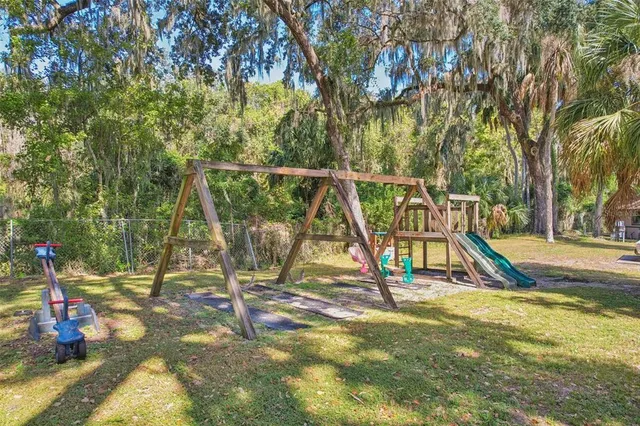 a view of park with a slide