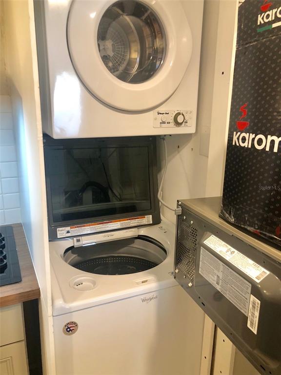 954 Lake Destiny Road, Unit E Altamonte Springs, FL 32714 - Photo 10 of 11 a utility room with dryer and washer