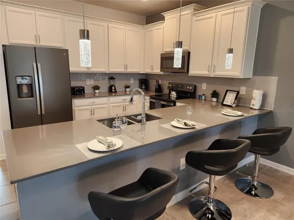 $3,200 | 8885 Cabot Cliffs Drive, Unit 104, Davenport, FL 33896