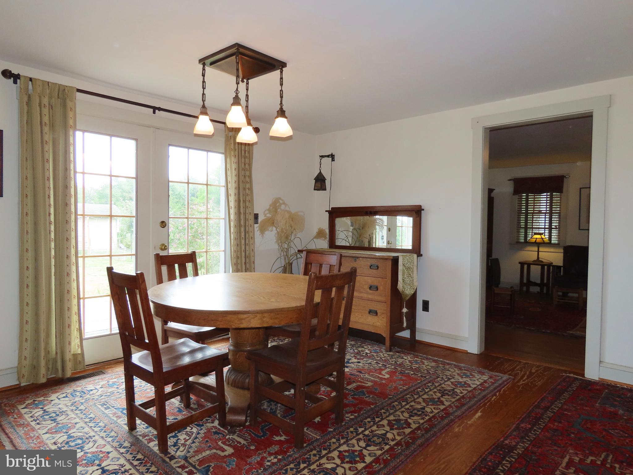 369 Hinsons Ford Road Amissville, VA 20106 - Photo 33 of 50 Dining Room overlooks garden and stables