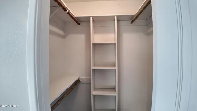 a close view of a sink and a refrigerator in a kitchen