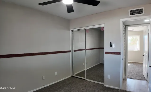 a room with furniture and a chandelier