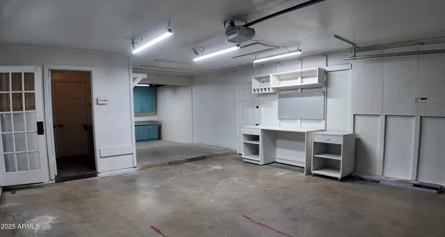 a bathroom with a sink and mirror