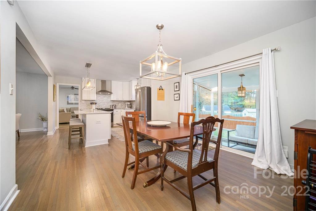 5200 Londonderry Road Charlotte, NC 28210 - Photo 14 of 28 a view of a dining room with furniture window and wooden floor