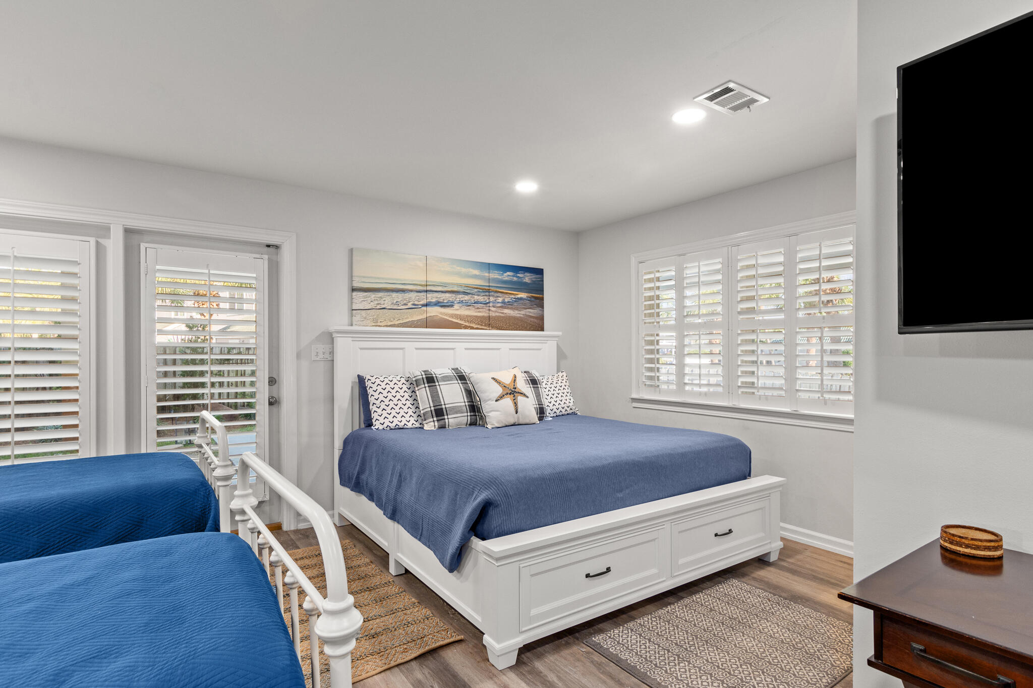 100 Sandprint Circle Destin, FL 32541 - Photo 21 of 62 a bedroom with a bed and a flat screen tv