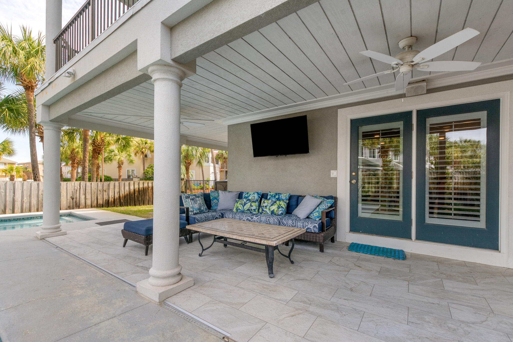 100 Sandprint Circle Destin, FL 32541 - Photo 59 of 62 a living room with furniture a flat screen tv and a fireplace