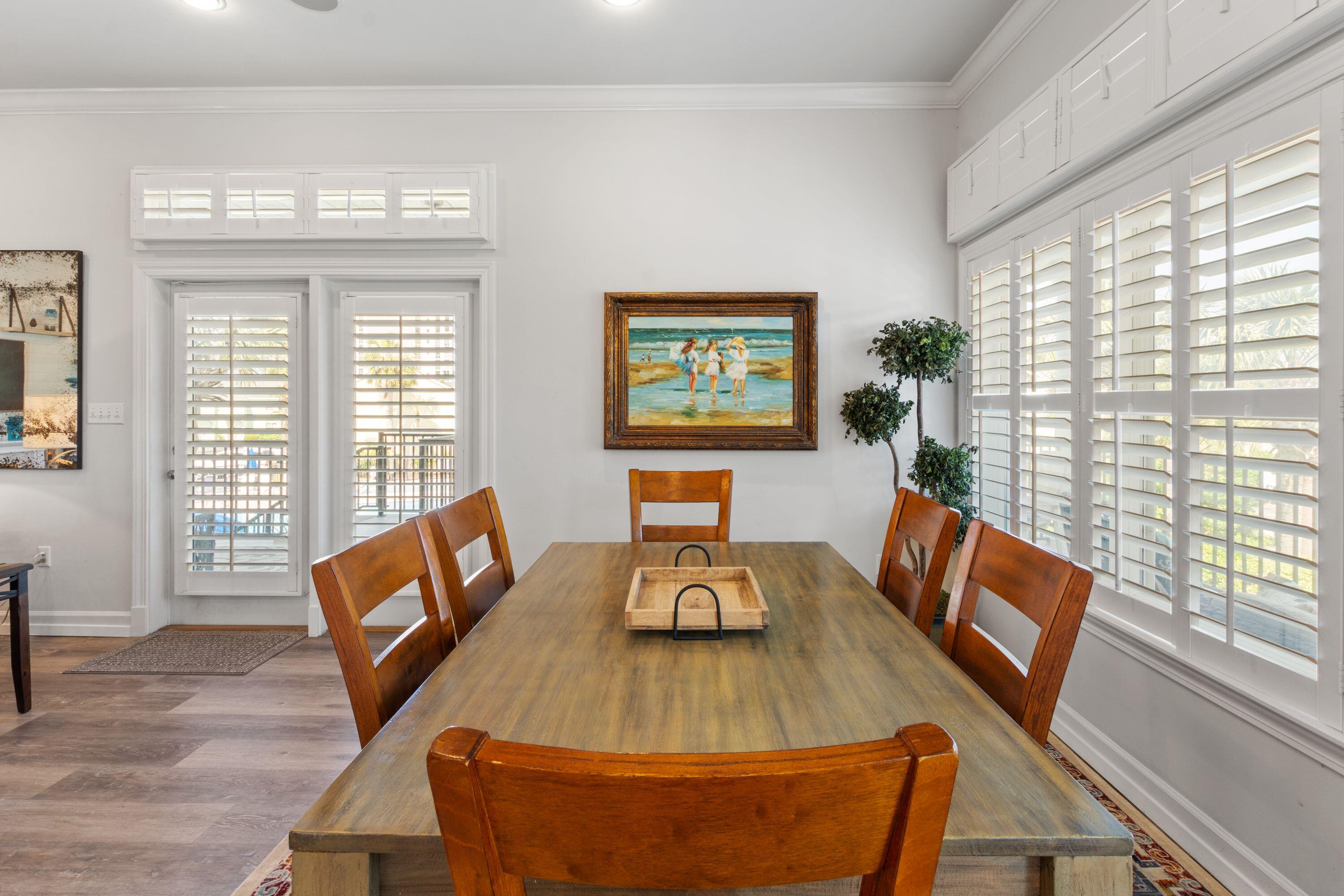 100 Sandprint Circle Destin, FL 32541 - Photo 9 of 62 a dining room with furniture and windows