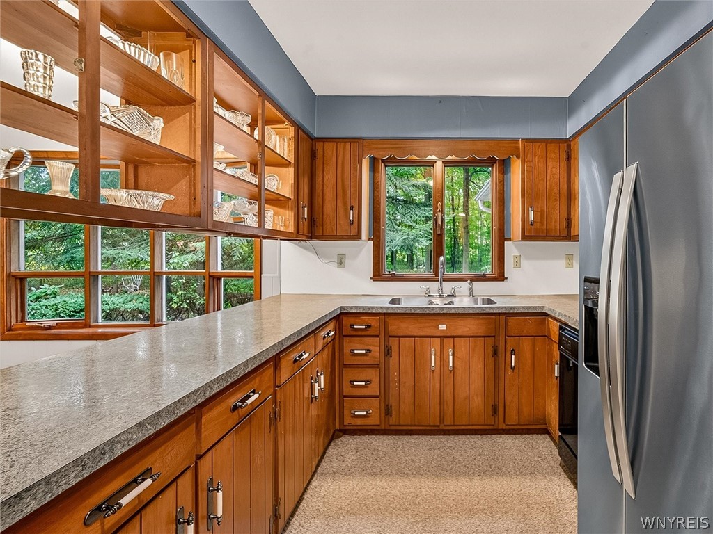 11620 Platten Road Yates, NY 14098 - Photo 17 of 49 Kitchen sink window has a beautiful view of wooded lot