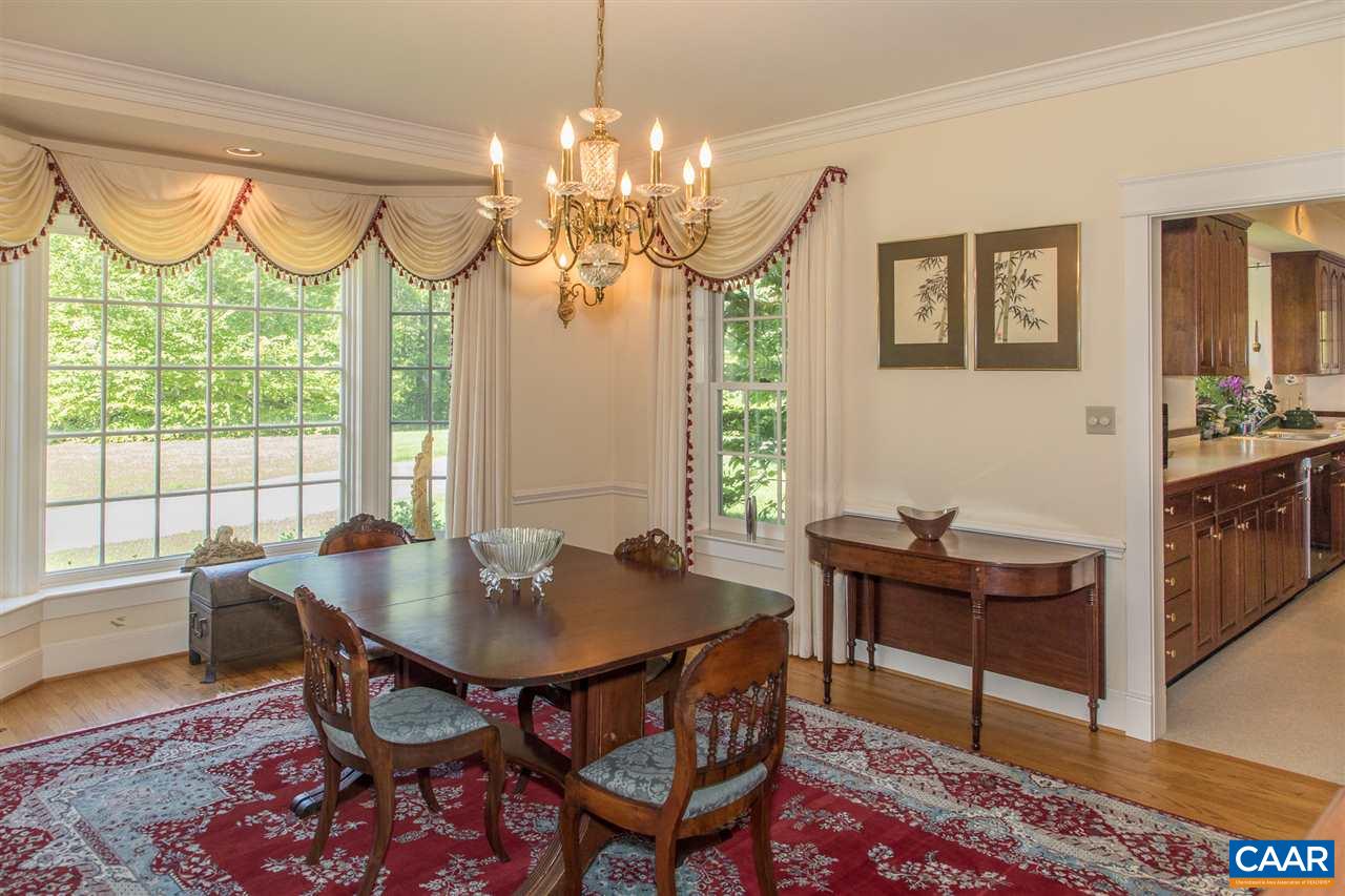 3897 Free Union Road Charlottesville, VA 22901 - Photo 12 of 47 a view of a dining room with furniture window and wooden floor