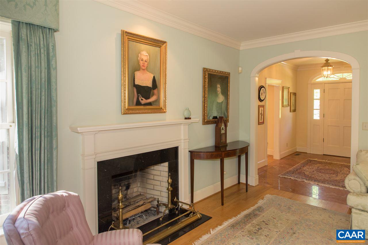 3897 Free Union Road Charlottesville, VA 22901 - Photo 13 of 47 a living room with furniture a mirror and a fireplace