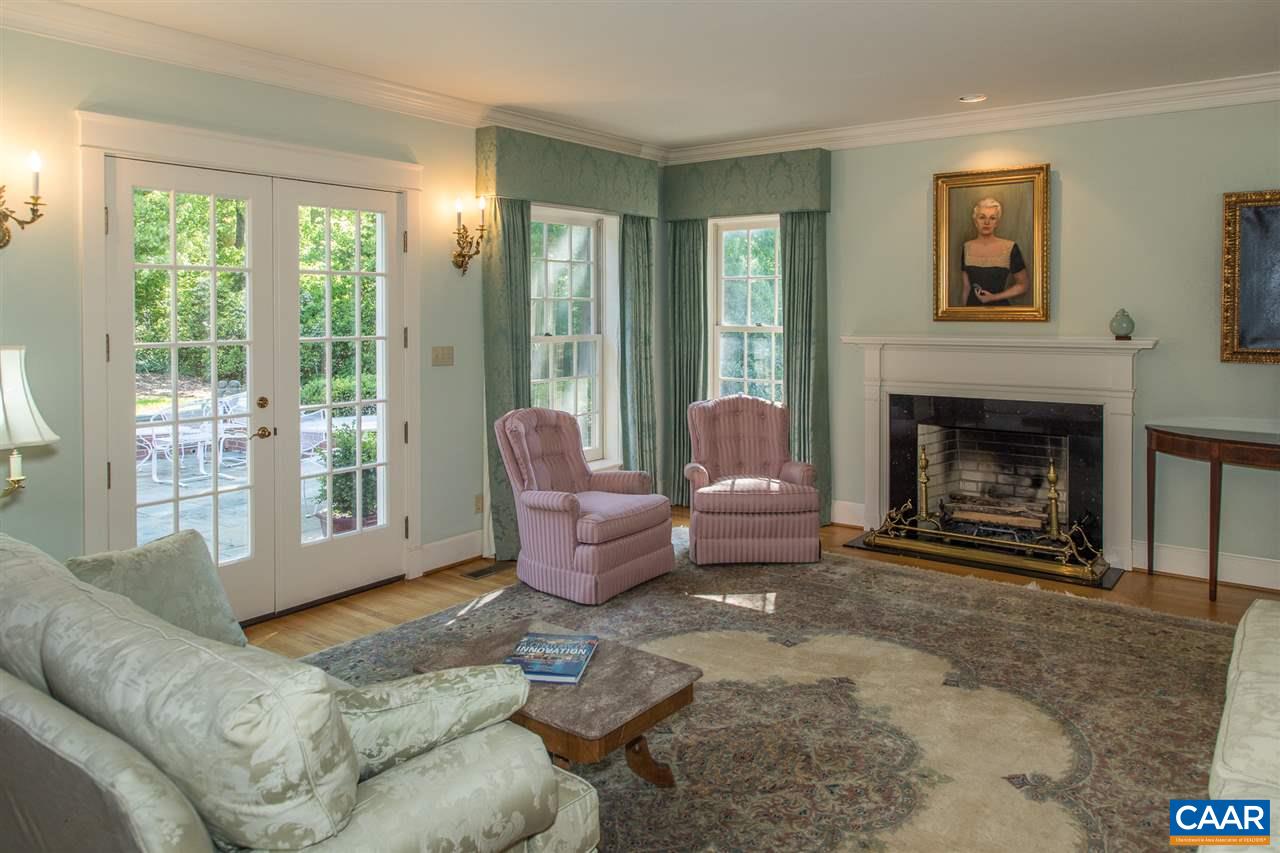 3897 Free Union Road Charlottesville, VA 22901 - Photo 15 of 47 a living room with furniture and a fireplace