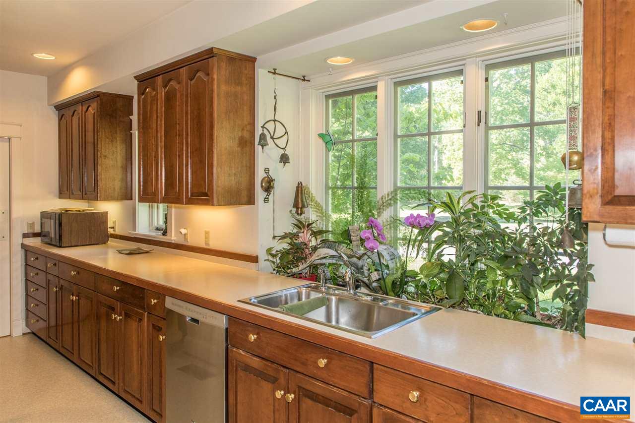 3897 Free Union Road Charlottesville, VA 22901 - Photo 22 of 47 a view of a potted plant and a window in a kitchen