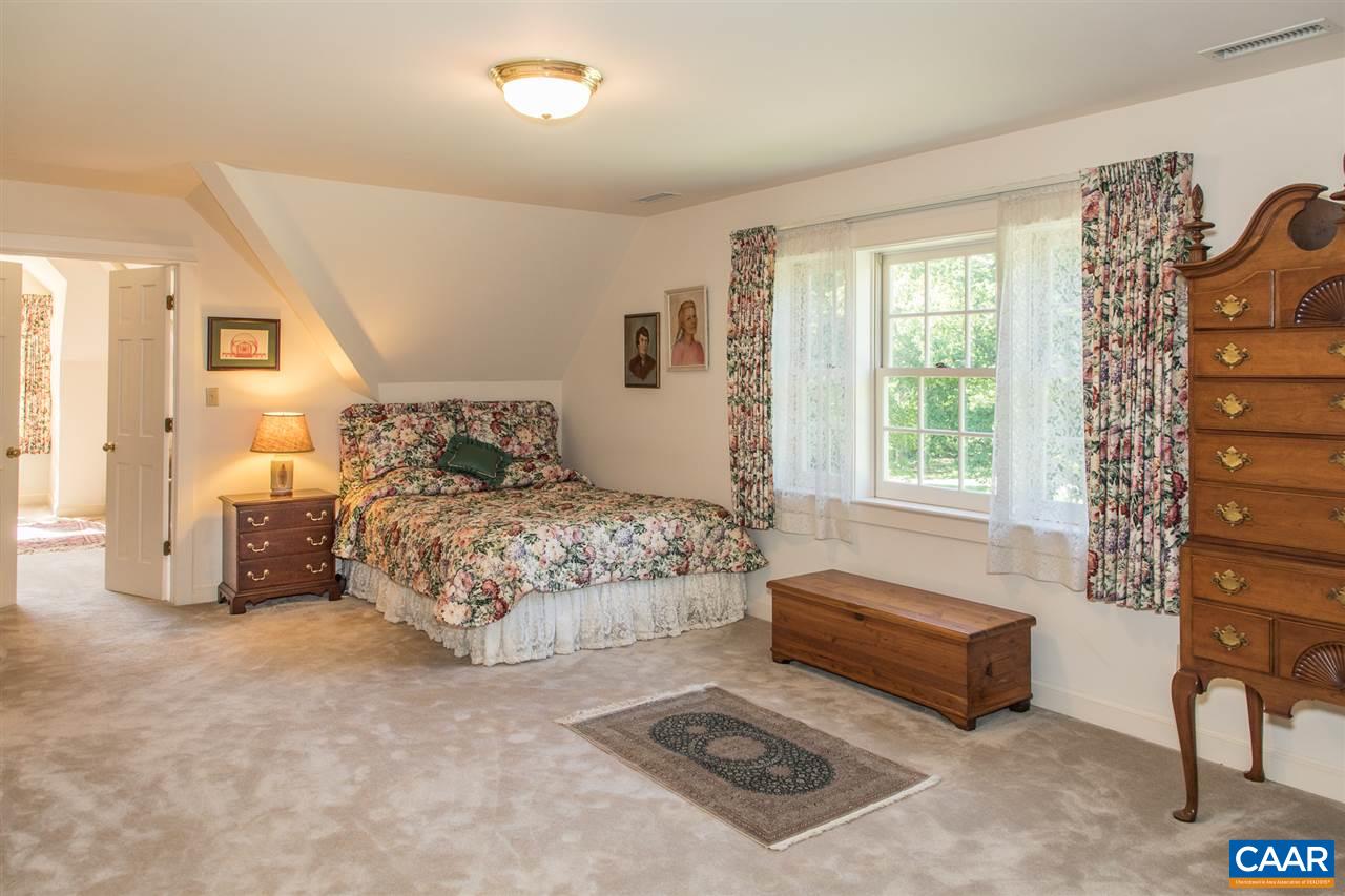 3897 Free Union Road Charlottesville, VA 22901 - Photo 30 of 47 a bedroom with a bed and a table