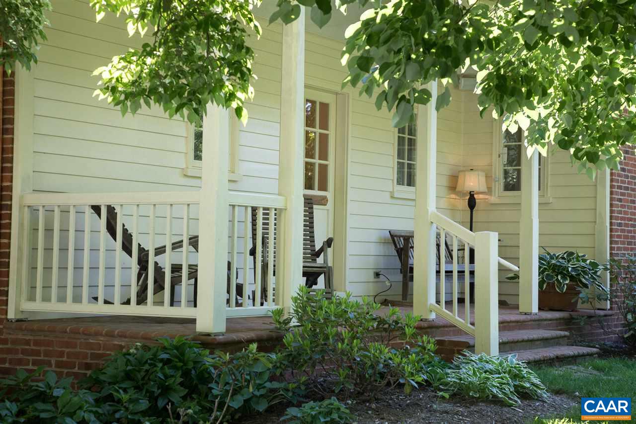 3897 Free Union Road Charlottesville, VA 22901 - Photo 3 of 47 a front view of a house with a garden