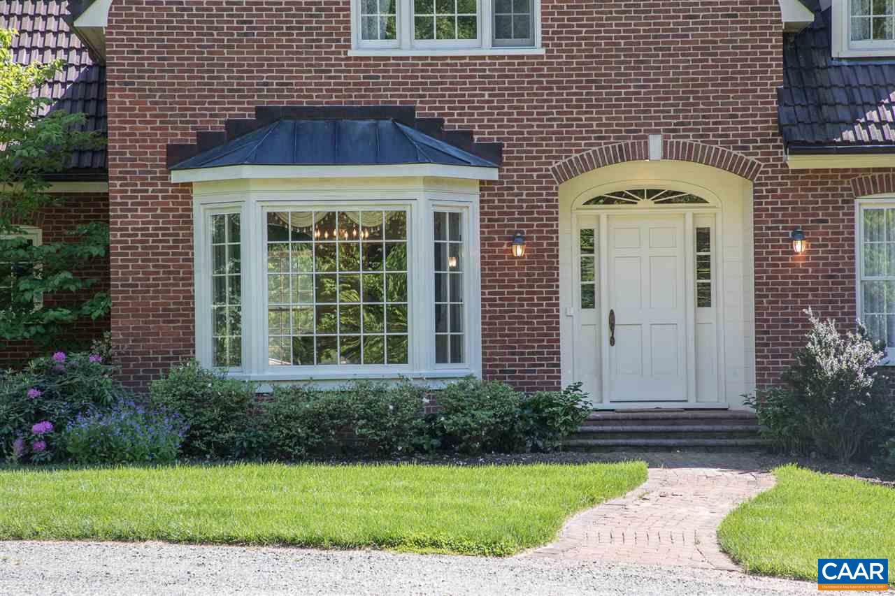 3897 Free Union Road Charlottesville, VA 22901 - Photo 10 of 47 a front view of a house with garden