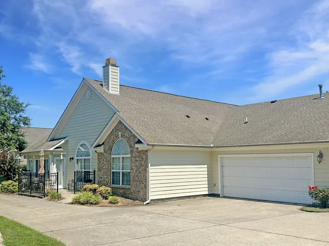 a view of a house with a street