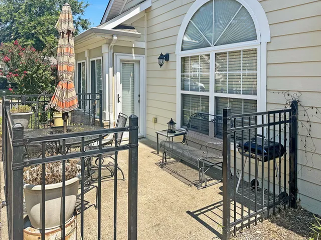 a view of house with a outdoor seating