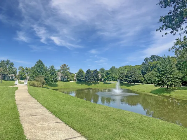 a view of a lake with a yard