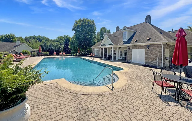 a view of a house with a swimming pool