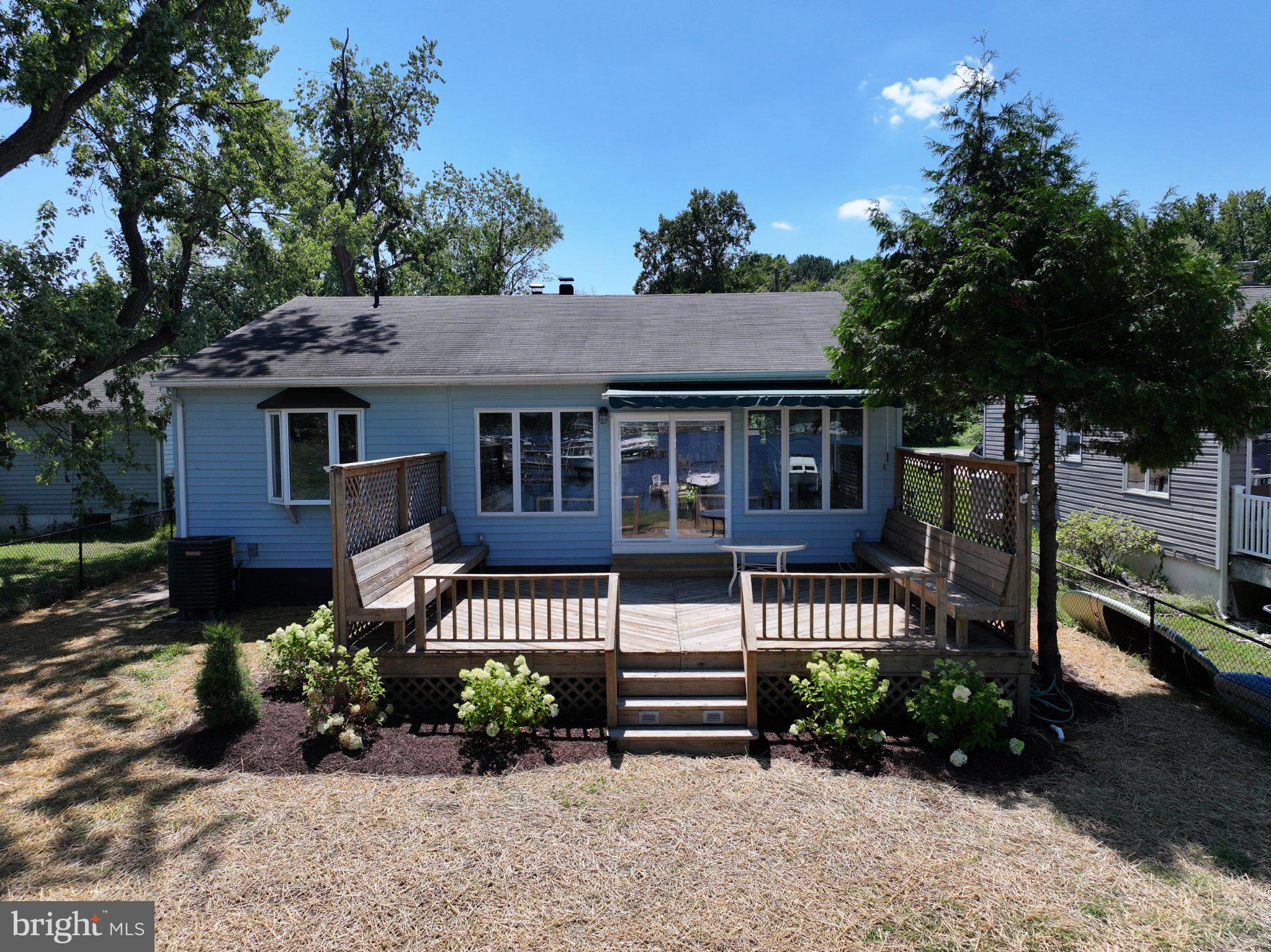 Charming home with inviting deck space.