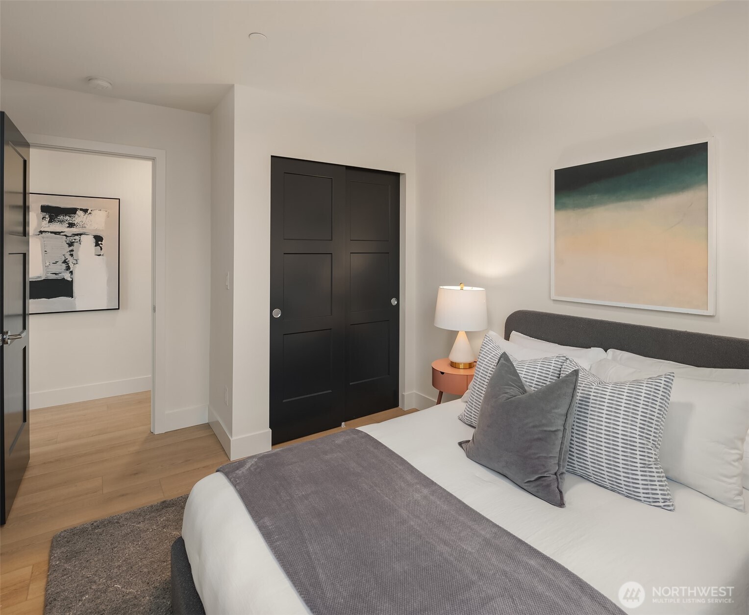 3612 Francis Avenue North Seattle, WA 98103 - Photo 14 of 36 a bedroom with a bed and a night stand