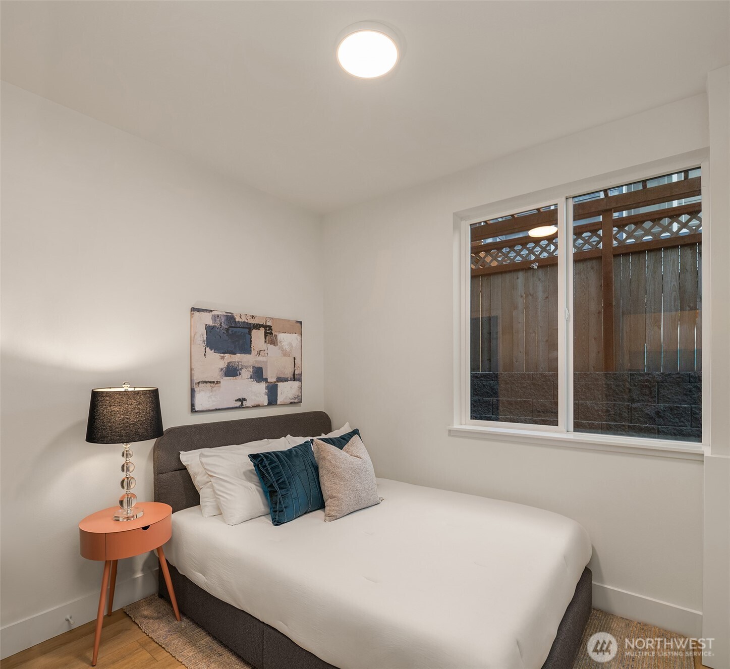 3612 Francis Avenue North Seattle, WA 98103 - Photo 22 of 36 a bedroom with a bed and a window