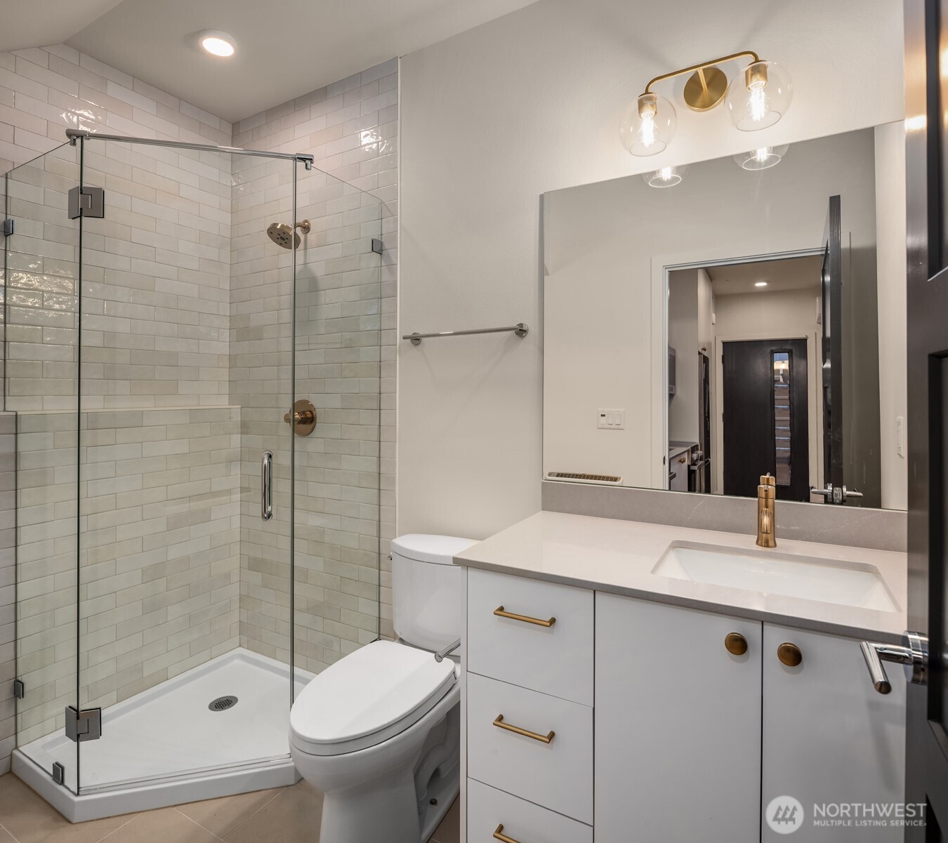 3612 Francis Avenue North Seattle, WA 98103 - Photo 23 of 36 a bathroom with a sink toilet and shower