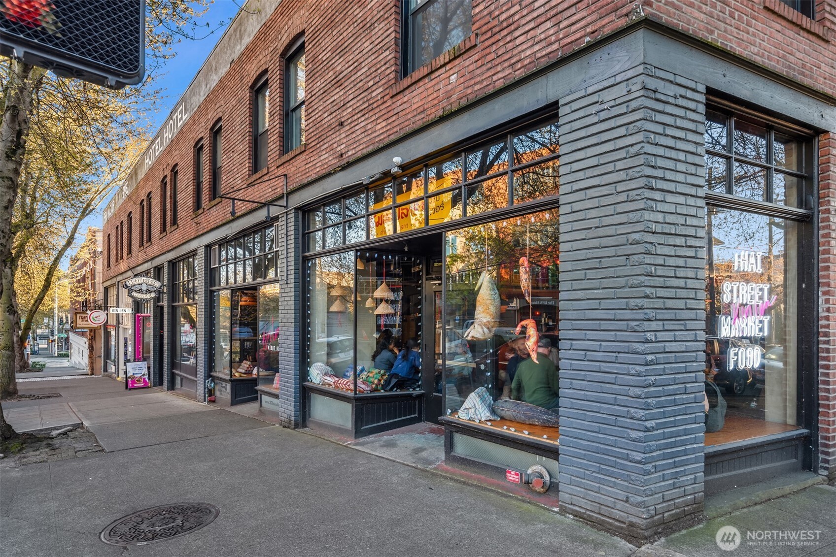 3612 Francis Avenue North Seattle, WA 98103 - Photo 28 of 36 a view of a brick building with a large window