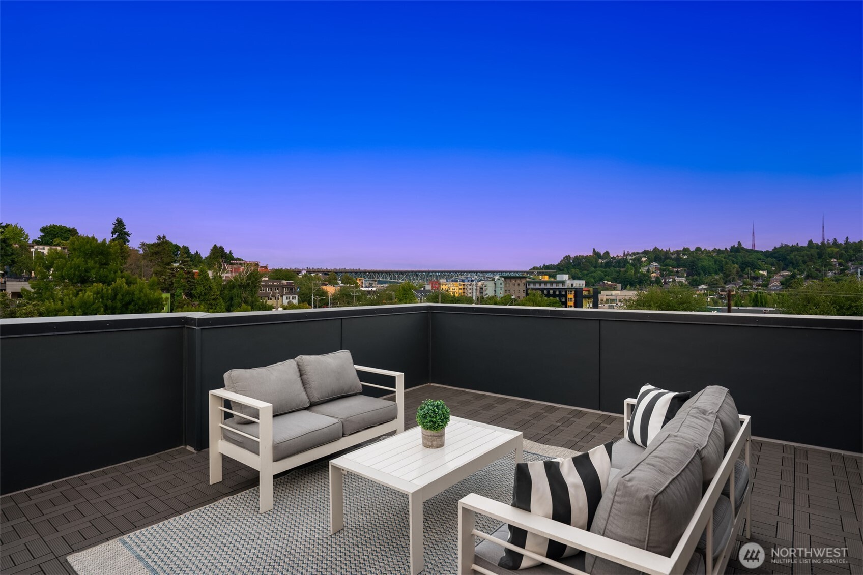 3612 Francis Avenue North Seattle, WA 98103 - Photo 6 of 36 a view of roof deck with seating space and hardwood