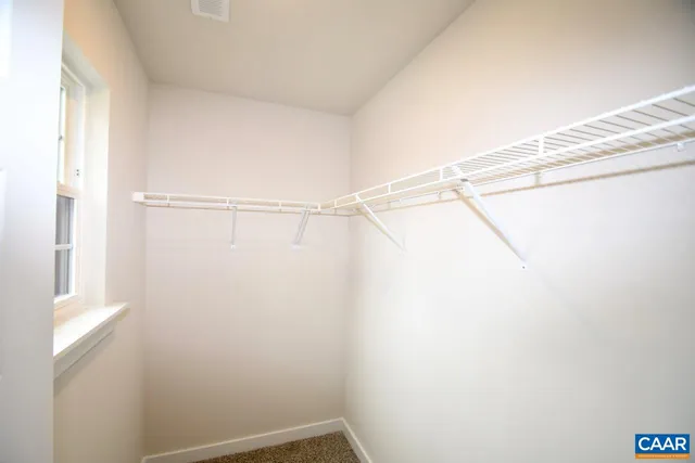 a view of a room with racks on the wall