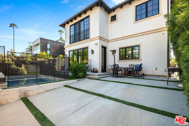 a view of a building with a patio
