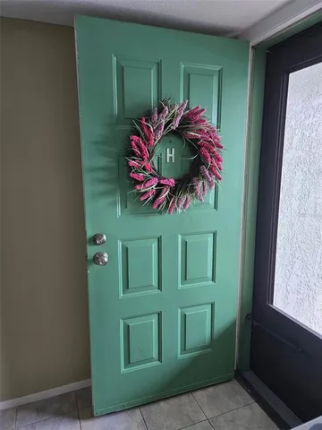 a kitchen with cabinets and appliances